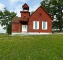 1559108-old-red-school-house-with-chipping-paint-a